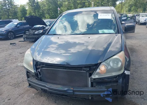 2010 Honda Odyssey Lx z USA, uszkodzony, nr VIN 5FNRL3H21AB059843